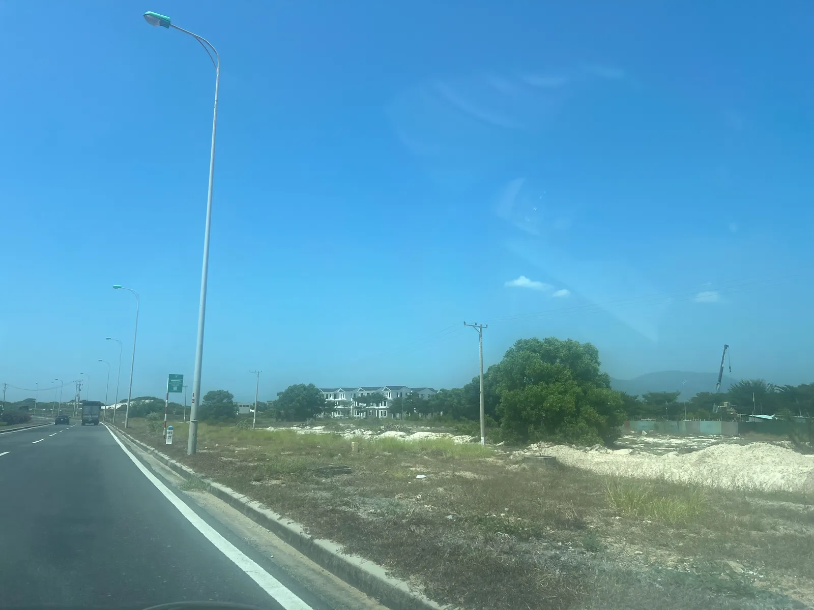 Đại lộ Nguyễn Tất Thành sát dự án MHDI Cam Ranh — tháng 7/2026